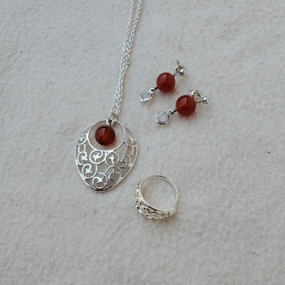 Silver tone and orange bead necklace, earrings, and ring set
